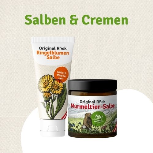 Foto auf der Seite "Murmeltier Salbe kaufen" - Text: Salben und Cremen und zu sehen ist eine Ringelblumesalbe Tube und eine Murmeltiersalbe im Tiegel